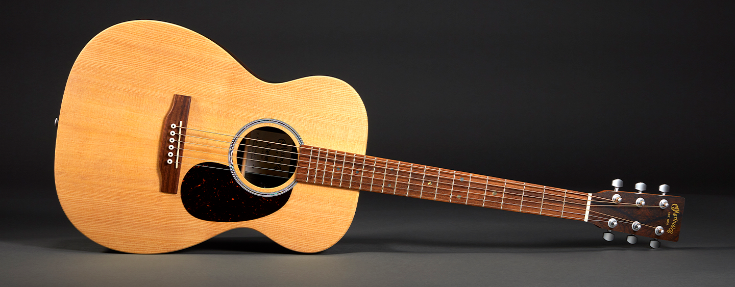 Photo of an acoustic guitar on its side
